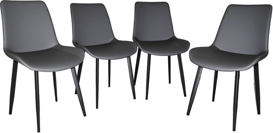 Une chaise de salle à manger en similicuir gris avec pieds en métal noir dans un cadre de salon.