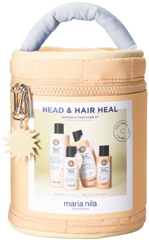 Trousse de toilette couleur crème avec imprimé 'Head & Hair Heal Shampoo & Conditioner Kit', contenant des bouteilles Maria Nila.