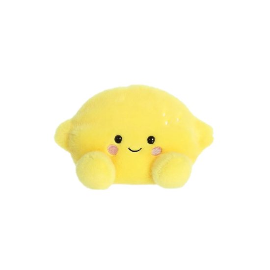 Une peluche citron jaune et douce avec un sourire, des joues roses et des yeux noirs.