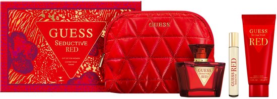 Guess Seductive Red giftset voor dames: rode toilettas, rood parfumflesje, rode bodylotion en een cadeaubox met rood patroon.