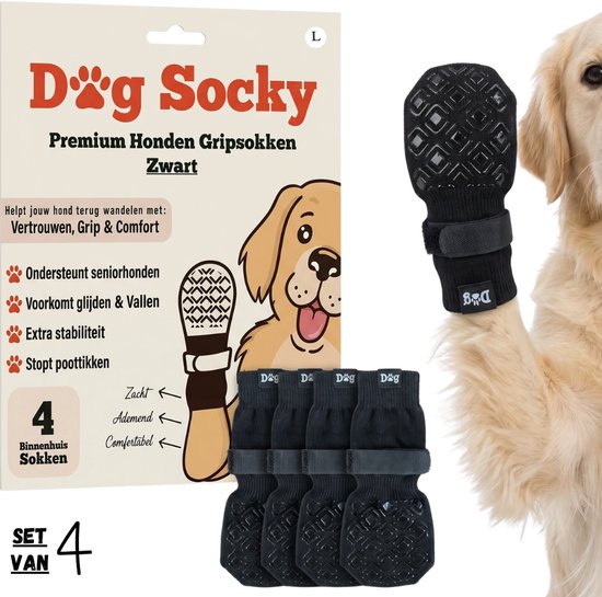 Emballage de 4 chaussettes noires Dog Socky premium taille L avec semelles antidérapantes et velcro réglable. Golden Retriever en arrière-plan.