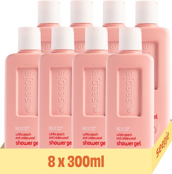 Acht flessen Seepje witte perzik en cederhout douchegel in een gele verpakking, elk 300ml.