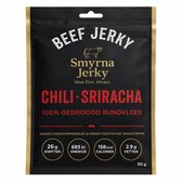 Smyrna Jerky Beef Jerky Chili-Sriracha verpakking. Zwart met goudkleurige randen. 100% gedroogd rundvlees.