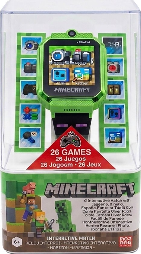 Minecraft smartwatch in verpakking, groen met pixelafbeeldingen en "26 GAMES" op de voorkant.