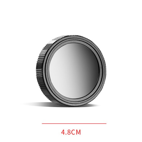 Zwarte ring met getextureerd loopvlak, met een cirkelvormige, reflecterende grijze lens. Afmeting 4.8CM.
