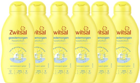 Zes gele Zwitsal goedemorgen haarlotion flessen naast elkaar op een witte achtergrond.