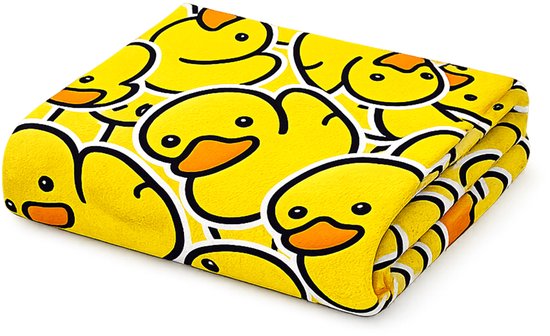 Serviette jaune pliée avec un motif de canards en caoutchouc.