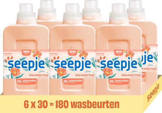 Voordeelverpakking van 6 Seepje wasverzachter flessen, peachkleurig met bloemenprint. 6 x 30 = 180 wasbeurten.