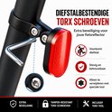 Diefstalbestendige torx schroeven van een rode fietsreflector, met speciale tool.