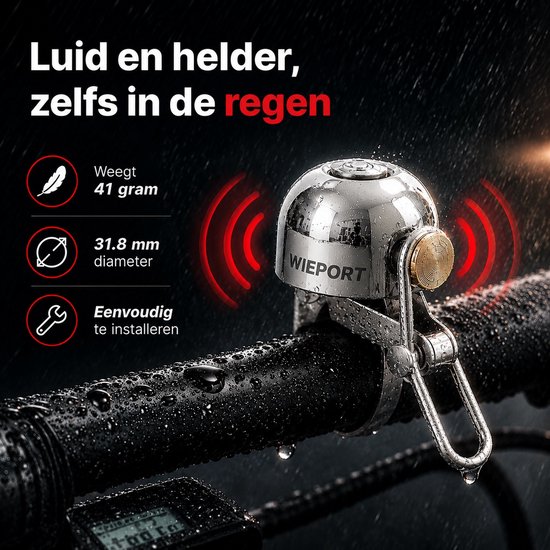 Zilveren fietsbel met gouden accent, met waterdruppels, op stuur.