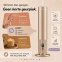 Gouden FUSIFY LX diffuser naast een kaars en een roomspray. "Slimmer dan sprayen. Geen korte geurprik"