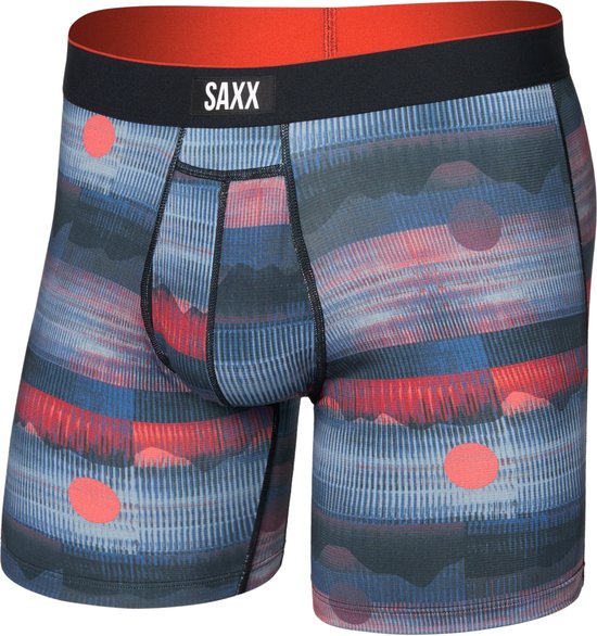 Boxer avec logo SAXX, motif abstrait bleu, rouge et rose avec des cercles et ceinture orange.