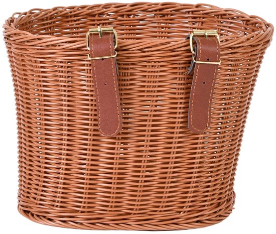 Bruine rotan fietsmand met bruine leren bandjes en gespen.