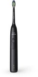 Zwarte Philips Sonicare elektrische tandenborstel met witte borstelharen en groene accenten.