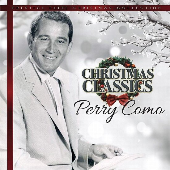 Perry Como op de albumhoes 'Christmas Classics'. Hij draagt een licht pak en glimlacht. Kerstkrans met strik.