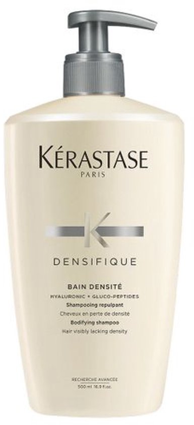 Shampoing Kérastase Densifique Bain Densité dans un flacon crème avec pompe grise. Texte : DENSITÉ, HYALURONIC + GLUCO-PEPTIDES.