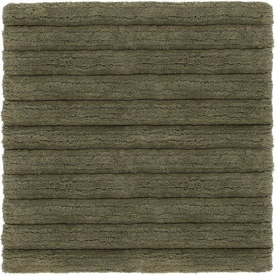 Ovaal groene badmat met horizontale ribbels, van bovenaf gezien.