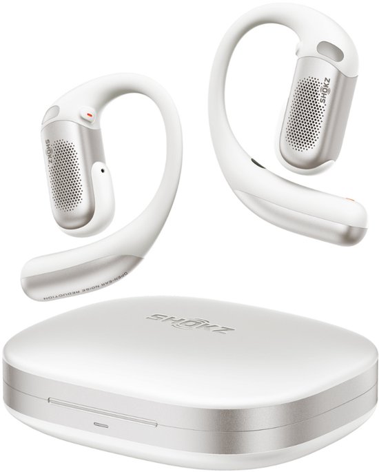 Witte Shokz OpenFit Pro oordopjes met open oor-ontwerp en een witte oplaadcase.