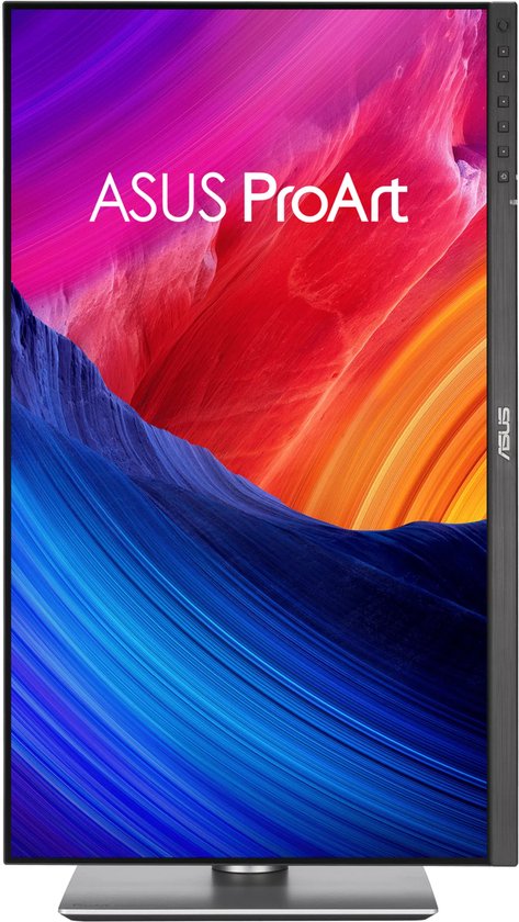 ASUS ProArt monitor met een verticale abstracte achtergrond met kleuren zoals blauw, rood, roze en oranje.