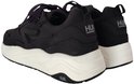 Zwarte HUB sneakers met witte zolen en HUB logo op de achterkant.