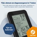 Close-up van een zwart weerstation display met tijd, datum en dag van de week. Opties voor taalweergave, inclusief Nederlands.