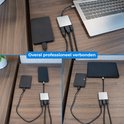 Set van 3 afbeeldingen die de Nuvance USB-C adapter demonstreren in verschillende setups met externe harde schijven, laptops en tablets.