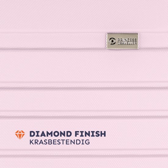 Detail van de 'diamond finish' textuur op de lichtroze koffer.