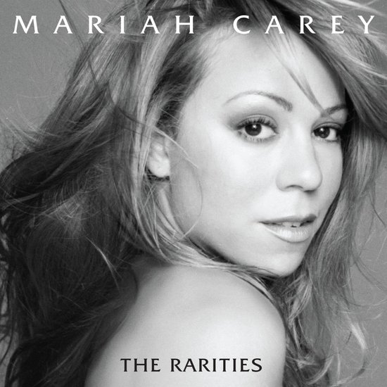 Mariah Carey, The Rarities albumcover. Close-up van Mariah Carey met wapperend haar.