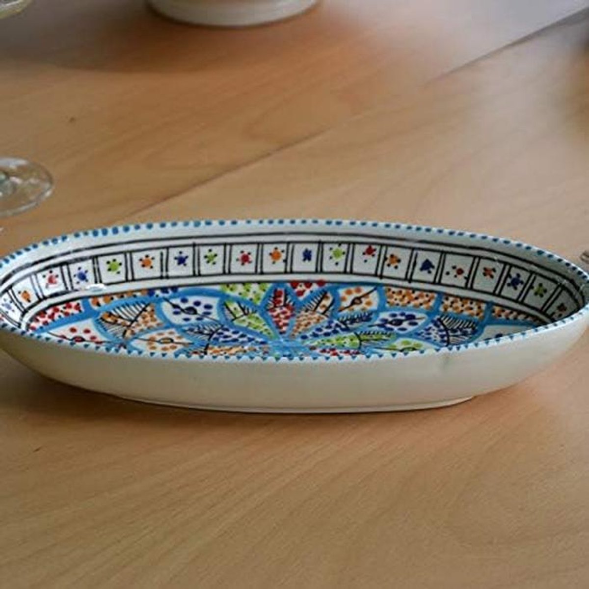 Groot ovaal serveerbord met handgeschilderd decor