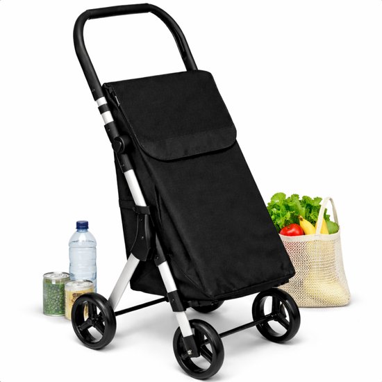 Chariot de courses noir à quatre roues, une bouteille d'eau et des boîtes à côté d'un sac de courses rempli de fruits et légumes.