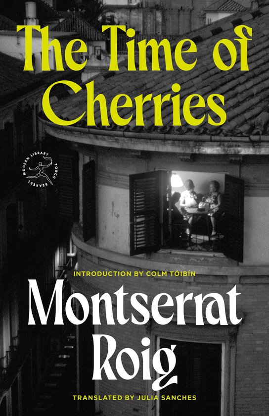 Boekomslag van "The Time of Cherries" met gele tekst op een zwart-wit foto van een gebouw met een open raam.