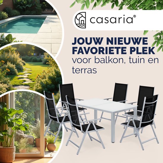 Casaria tuinset met tafel en zes stoelen in een tuin en aan een zwembad.