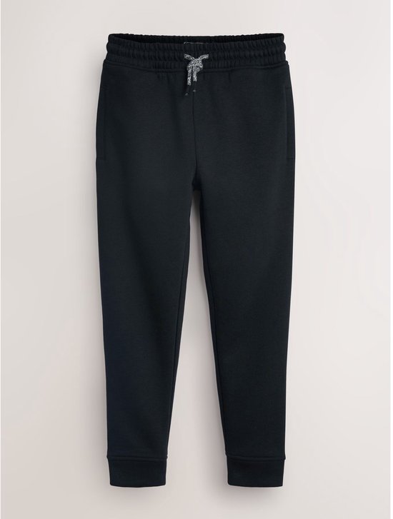 Zwarte joggingbroek met elastische tailleband en trekkoord.