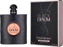 Zwarte flacon met glitterafwerking naast de bijpassende zwarte doos met 'BLACK OPIUM'.