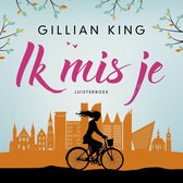 Boekomslag "Ik mis je" van Gillian King met silhouet van een vrouw op de fiets voor een stad met oranje gebouwen.