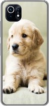 Geschikt voor Xiaomi Mi 11 hoesje - Golden Retriever puppy liggend op de bank - Siliconen Telefoonhoesje