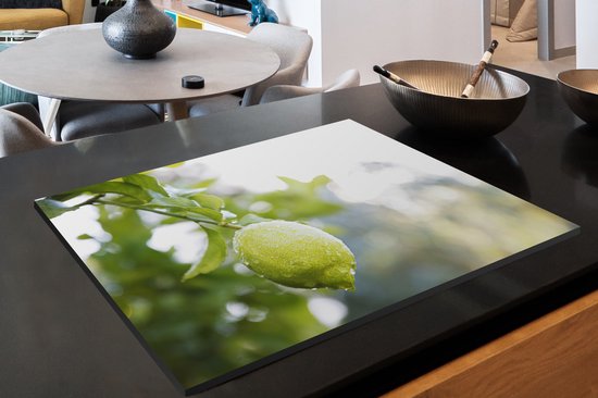 KitchenYeah® Inductie beschermer 80x52 cm - Close up of wet lime on branch - Kookplaataccessoires - Afdekplaat voor kookplaat - Inductiebeschermer - Inductiemat - Inductieplaat mat