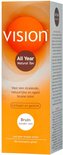 Doos van Vision All Year Natural Tan zelfbruiner met oranje cirkel en gedetailleerde tekst.