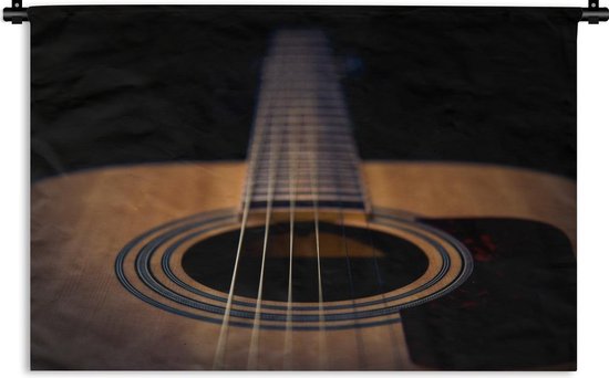 Wandkleed Akoestische gitaar - Close up van een Akoestische gitaar op een zwarte achtergrond Wandkleed katoen 180x120 cm - Wandtapijt met foto XXL / Groot formaat!