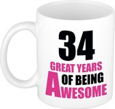 34 great years of being awesome cadeau mok / beker wit en roze