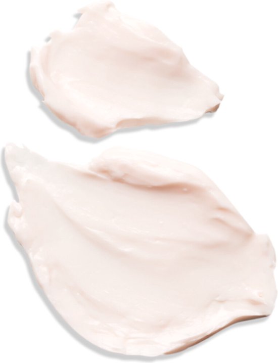 Twee vegen van lichte, romige crème met een roze ondertoon.