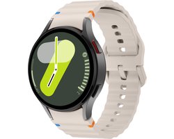 Strap-it Siliconen Wave bandje - Geschikt voor Samsung Galaxy Watch 7 (40 & 44mm) / Galaxy Watch 6 (Classic) / Galaxy Watch 5 (Pro) / Galaxy Watch 4 (Classic) - sterrenlicht