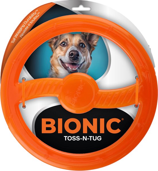 Oranje Bionic Toss-N-Tug ring met een lachende hond op de achtergrond.