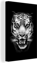 Canvas Schilderij Kop van een tijger tegen een zwarte achtergrond - zwart wit - 40x60 cm - Wanddecoratie