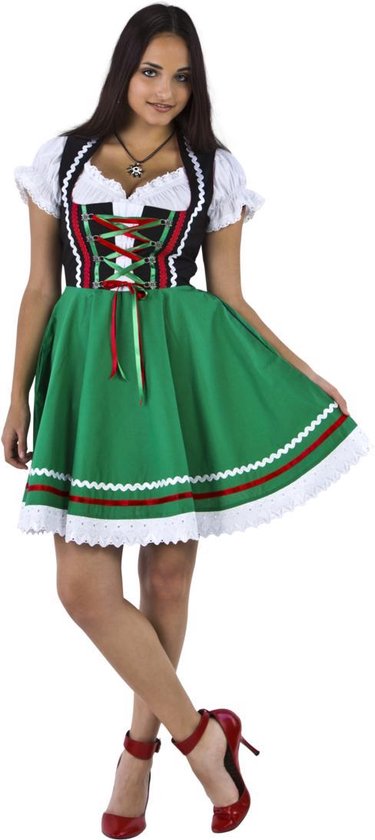 Model in een zwarte en groene dirndl met witte blouse, rode veter sluiting.