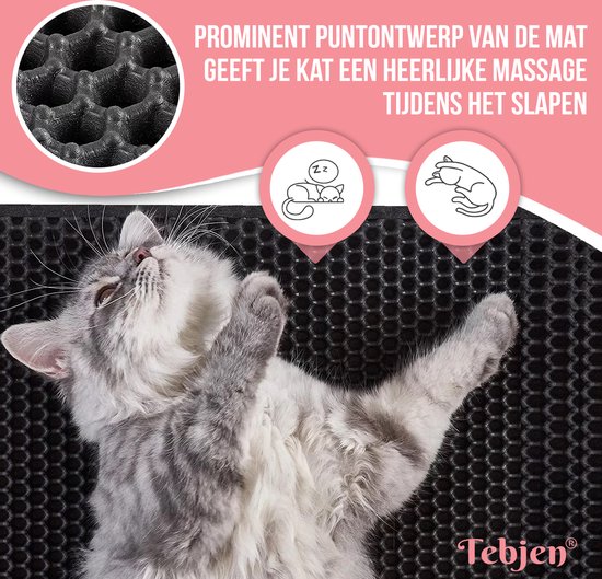Zwarte kattenbakmat met prominent puntontwerp dat je kat een massage geeft tijdens het slapen.
