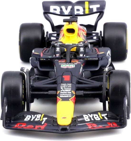 Vooraanzicht van een zwarte Formule 1 auto RB18 met gele neus en Red Bull logo's.