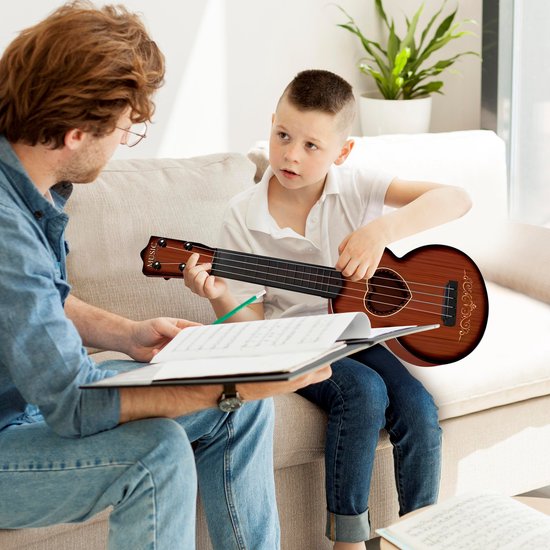 Muzikale ontwikkeling baby's, peuters en kleuters; muziek maken met