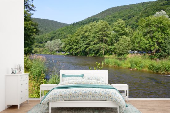 Behang - Fotobehang Een rivier stroomt door de Ardennen - Breedte 330 cm x hoogte 220 cm
