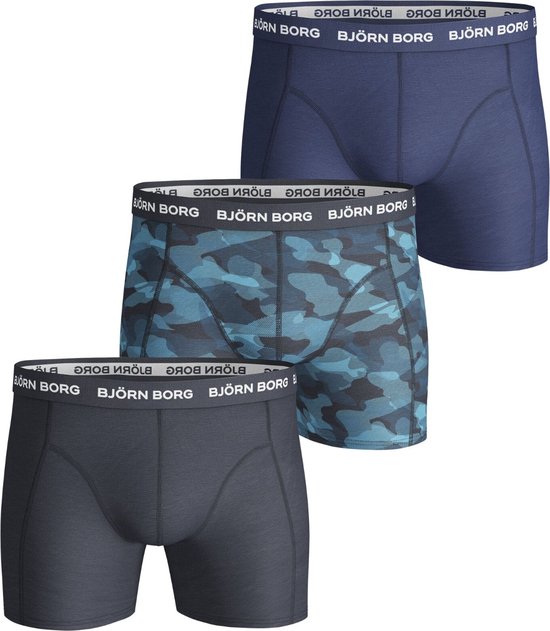 Set van drie boxershorts: donkergrijs, blauw camouflage, effen donkerblauw. Allemaal met Björn Borg-band.